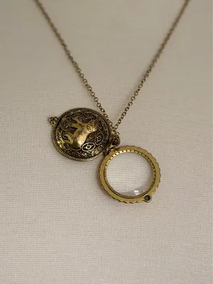 Gold Tone Elephant Magnifying Glass Necklace