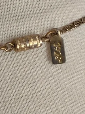 1928 Gold tone Filigree Purse Locket