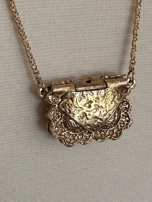 1928 Gold tone Filigree Purse Locket
